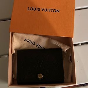 Original Louis Vuitton business card holder .hardly used it .